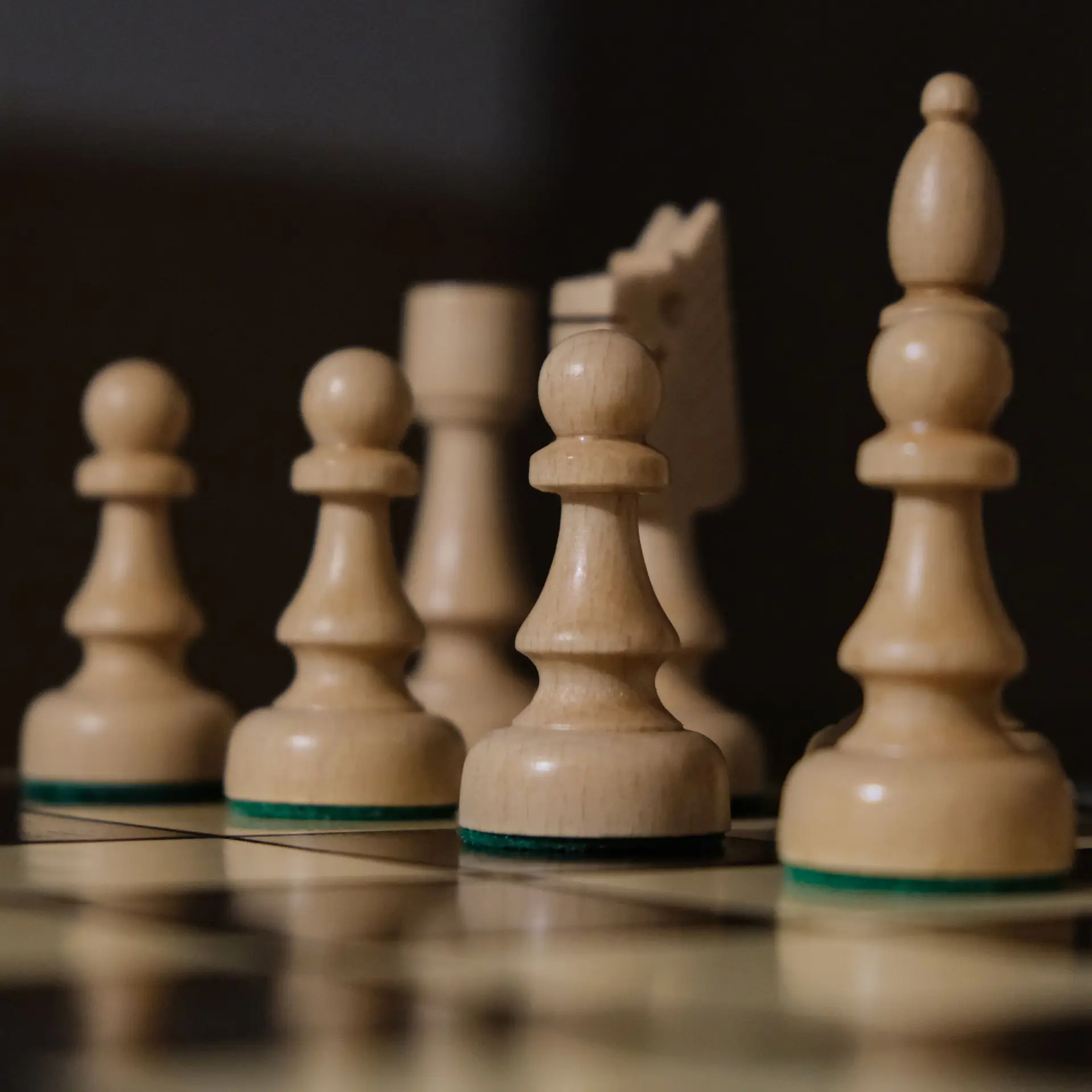 Close view of wooden chess pieces